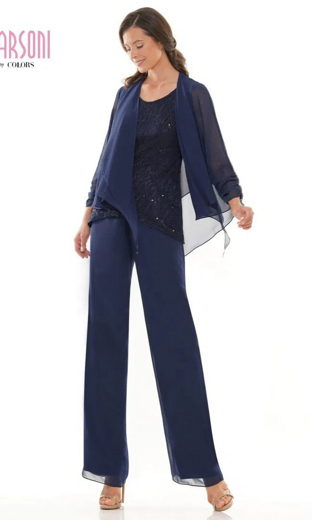 A woman models the Marsoni M303 Long Formal Pantsuit in navy, featuring a chiffon jacket, sequin top, and wide-leg pants, standing against a white background.